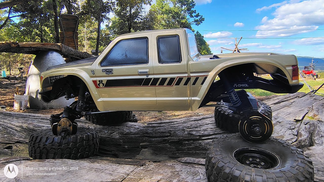 AXIAL COYOTE: TREAL BRASS UPGRADES all over and Watch The Coyote Attack The Teeter Totter!