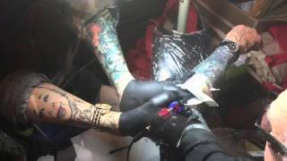 Legz, the armless tattooist, tattoos industry legend Lyle Tuttle