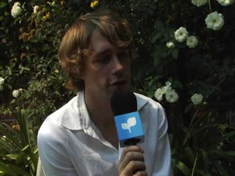 Jonas Bjerre can't beat kids at Guitar Hero.