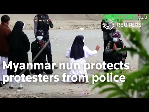 Myanmar nun protects protesters from police