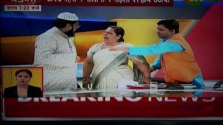 Maulana Ejaz Arshad Qasmi slaps advocate Farah Faiz on Live TV Debate on Zee Hindustan