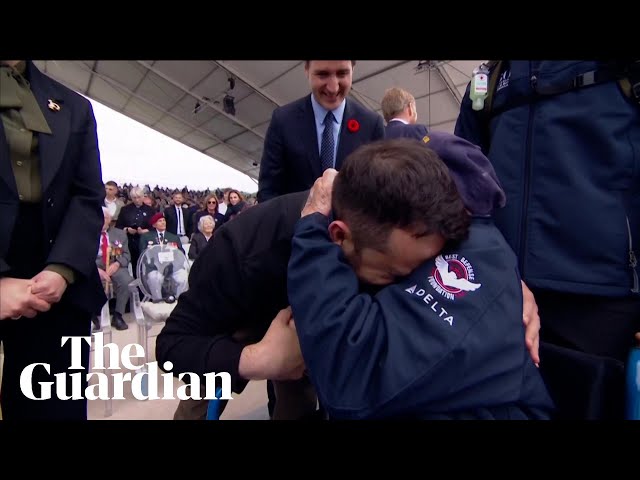 'You saved Europe': Zelenskiy shares emotional embrace with D-day veteran class=