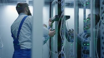 Technicians Working In Data Center Stock Video
