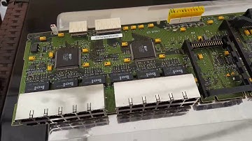 Scrapping out a network switching hub to determine its value (great telecom board)