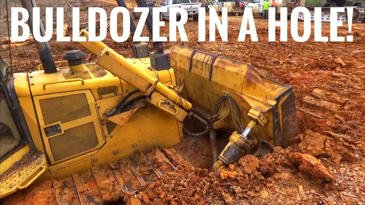 Bulldozer in a deep hole! YouTube