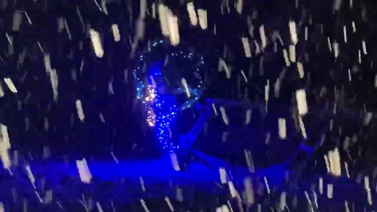 Lake Bellaire-Our boat hoist lit up in the snowy yard-12/4/24-iphone vid