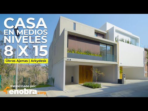 Video: Casa contemporánea integrando árboles en su arquitectura moderna: 2 Oaks House by OBIA