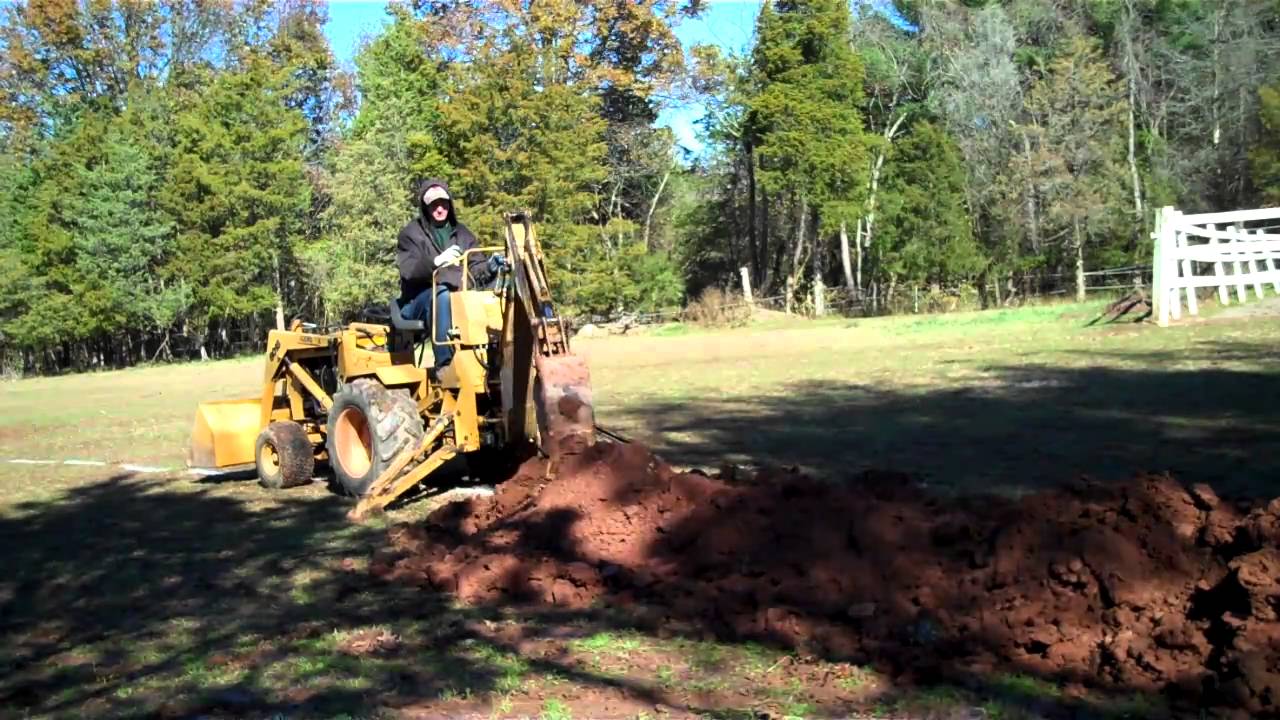 Trenching for electric with ingersoll 6018 backhoe YouTube