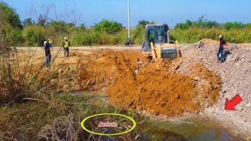 Nice skill operator by bulldozer SHANTUI Push the soil into the water, 25ton dump truck, Mix VDO
