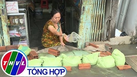 THVL | Người dân TP.HCM chật vật chống chọi với triều cường