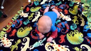 Jacoby rolling over on his own at 11 weeks