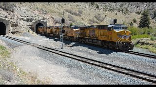 Union pacific empty coal train exits century old tunnel Kyune, Utah