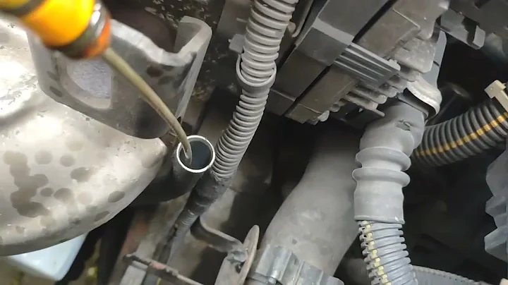 Smoke out of oil dipstick Astra G