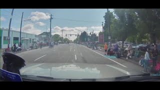 Dash cam video shows driver ignoring parade goers