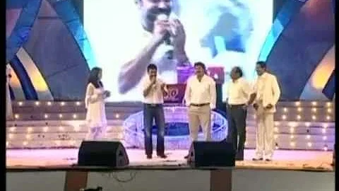 Surya receives award from Mammootty