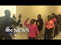 Teacher Greets Each Student With A Personalized Handshake