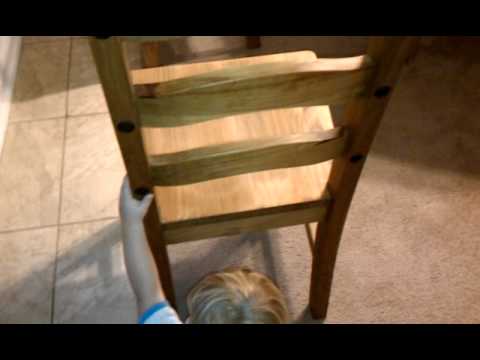 Toren works his way through a home made obstacle course