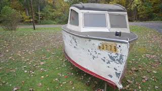 this is a first view of this 16 foot boat that has been in storage since 1961 with a time capsule of new old parts and accessories.
