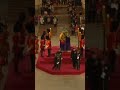 Royal guard faints next to queens coffin
