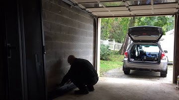 Yes, an APC AR3100 rack can fit into a Subaru Outback