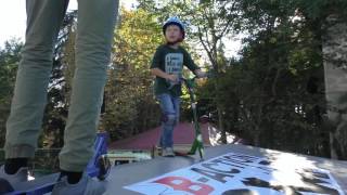 My son on a stunt scooter