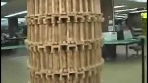 Clumsy Reporter Knocks Down Jenga Tower: Reverse video