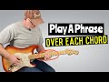 Play over the blues chord changes on guitar