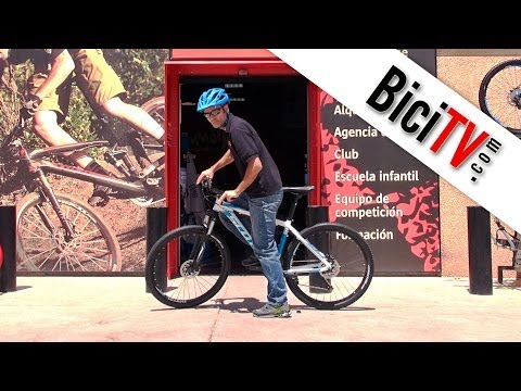 subasta formato agudo Cómo subir y bajar de la bicicleta (con la altura correcta del sillín) -  YouTube