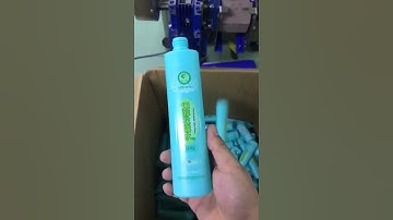Automatic double side labeling machine for clear labels