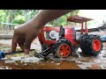 RC Tractor Is Working To Pump Flood Water At Farm in Rainy Season.
