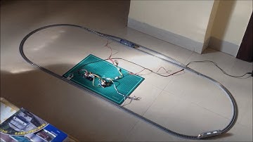 Running two trains on an automated layout