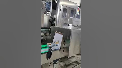 Automatic shrink sleeve label applicator for jars