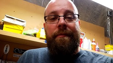 Compound radius fret level on a guitar.