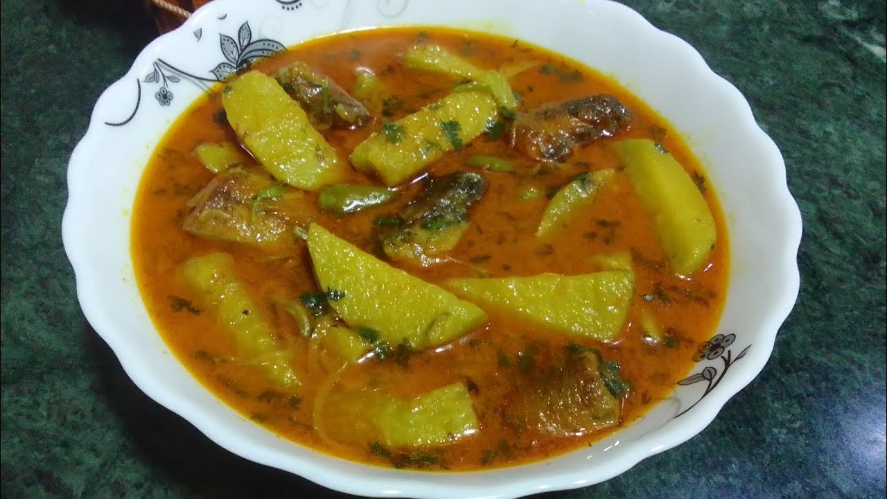 সাহেব আলু দিয়ে  শিং মাছ  তরকারির রেসিপি। 