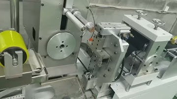 Automatic back to back velcro tape slitting rewinding machine