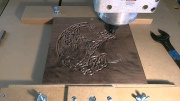 CNC cutting a walnut trivet