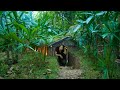 I Built complete and warm survival shelter  Bushcraft earth hut, grass roof & fireplace with clay