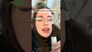 Duet with friend's toothbrush