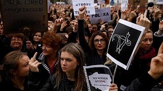 Polish women protest over planned abortion law Polish women protest over planned abortion law