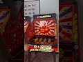 A carnival game of catching ducks with rings