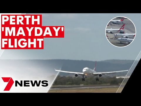 Qantas flight's emergency 'mayday' landing at Perth Airport | 7NEWS