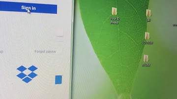 Dropbox couldn’t import photos because iPhone maybe locked . Unlocked and try again .