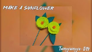 Make a sunflower out of colored paper and bamboo toothpicks