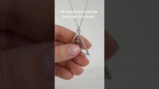 He creado un collar Giratorio de las reliquias #estres #ansiedad #reliquiasdelamuerte #harrypotter