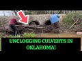 Clearing out culverts in farm land of oklahoma 062024