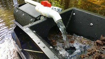 Feild testing the Gold Cube and the trommel in a creek in Sweden.
