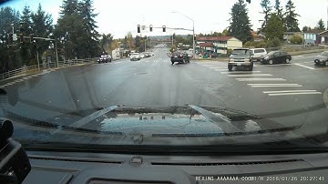 Attempt to Beat Yellow Light Ends in Crash in Front of Cop || ViralHog