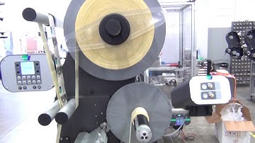 Top and Base Labelling System for Trays