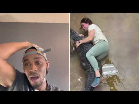 Woman let’s Alligator lay on her 🤦🏽‍♂️