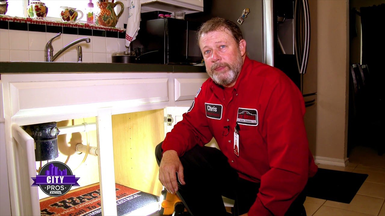 Replacing an old garbage disposal the Jon Wayne Way!